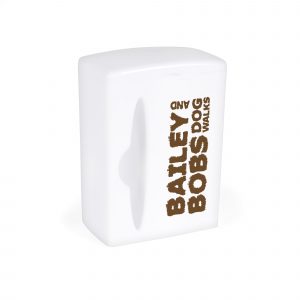 White plastic waste bag dispenser with built in clip. Includes 15 waste bags. Available in white.