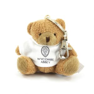 An 8cm beige bear with a white t-shirt printed up to full colour and a standard split ring attached. All bears conform to CE regulations and suitable for all ages.