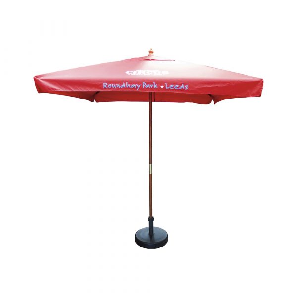 Substantial two metre square parasol with wooden stem. Heavy duty wooden stem and ribs with pull cord opening