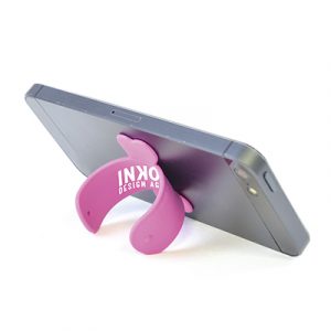Silicone strip attaches to the back of a phone and can be "snapped" together to create a stand for you phone. Made of silicone and available in various colours.