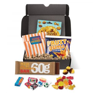Everything you need for a movie night in, chocolate, Haribo, Joe & Seph's Popcorn and retro sweets.