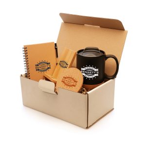 This environmentally minded gift set is a great way to introduce new customers to your brand and to send a positive eco message to existing clients and members of your team. The pack includes a Humber Travel Mug, Cork Coaster, A6 wiro bound Verno Notebook & Pen made from recycled paper and the functional Dylan Phone Stand made entirely from bamboo. The products will be supplied in the natural colours. Each promotional item can be personalised with your logo using a number of branding techniques such as printing and engraving. For a splash of colour, why not add a full colour print to the cover of the notebook? All products featured in this set are made with materials that are kinder to the environment including bamboo, cork and recycled paper. For use in the office or at home, these products will look great wherever the setting – you can send by post or hand out at your next event. If you've decided to go green for your next merchandise purchase, get in touch with us now to place your order.