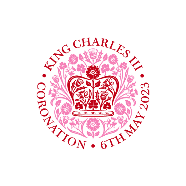 Kings Coronation Mug with the official commemorative emblem in red and pink.