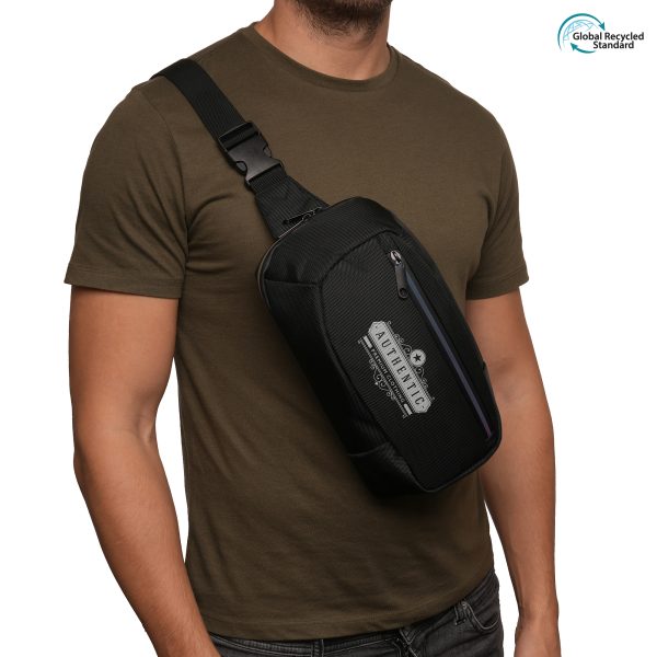 RPET cross chest bag with coloured reflective zippers, pocket to front and main compartments. Adjustable cross chest strap with buckle and padded webbed backing for easy carrying.