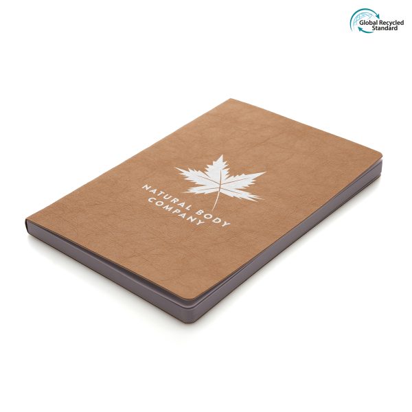 An eco-friendly notebook with Kraft paper and cardboard textured finished cover and 96 white lined recycled paper sheets. All materials are recycled or widely recyclable.