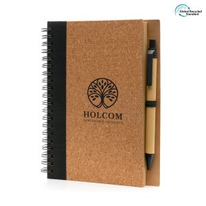 B6 eco-friendly spiral bound notebook with a natural cork cover, 70 lined recycled Kraft sheets with pre-printed eco message, pen loop and a PLA plastic pen with recycled paper body and black ink.