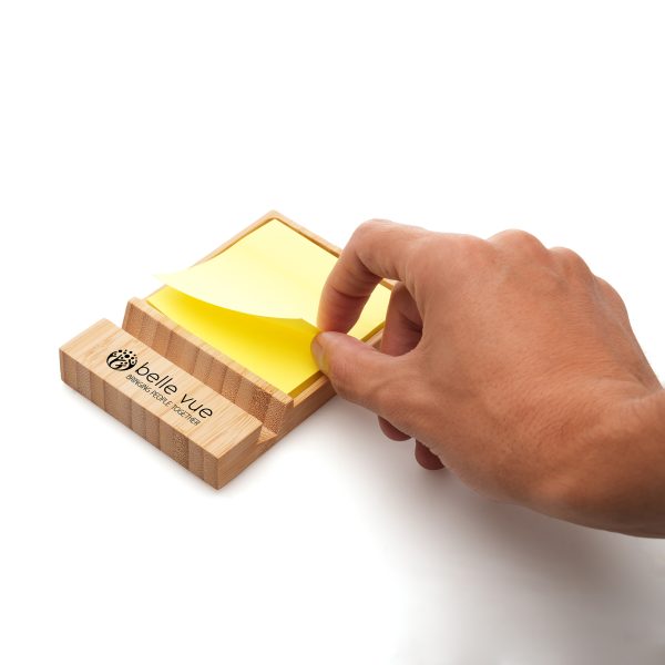 Bamboo phone stand and sticky note holder with 50 square yellow sticky notes.