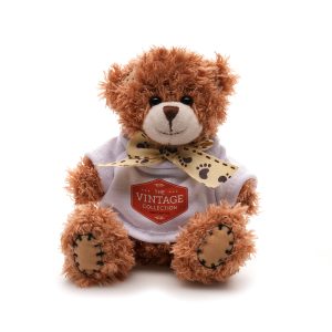 Crafted with polyester fabric and a charming ribbon neck tie for added elegance, this 12cm teddy bear comes with cotton filler, embroidered thread nose and mouth, suede hands, ear pads and plastic eyes adding a delightful tactile element.