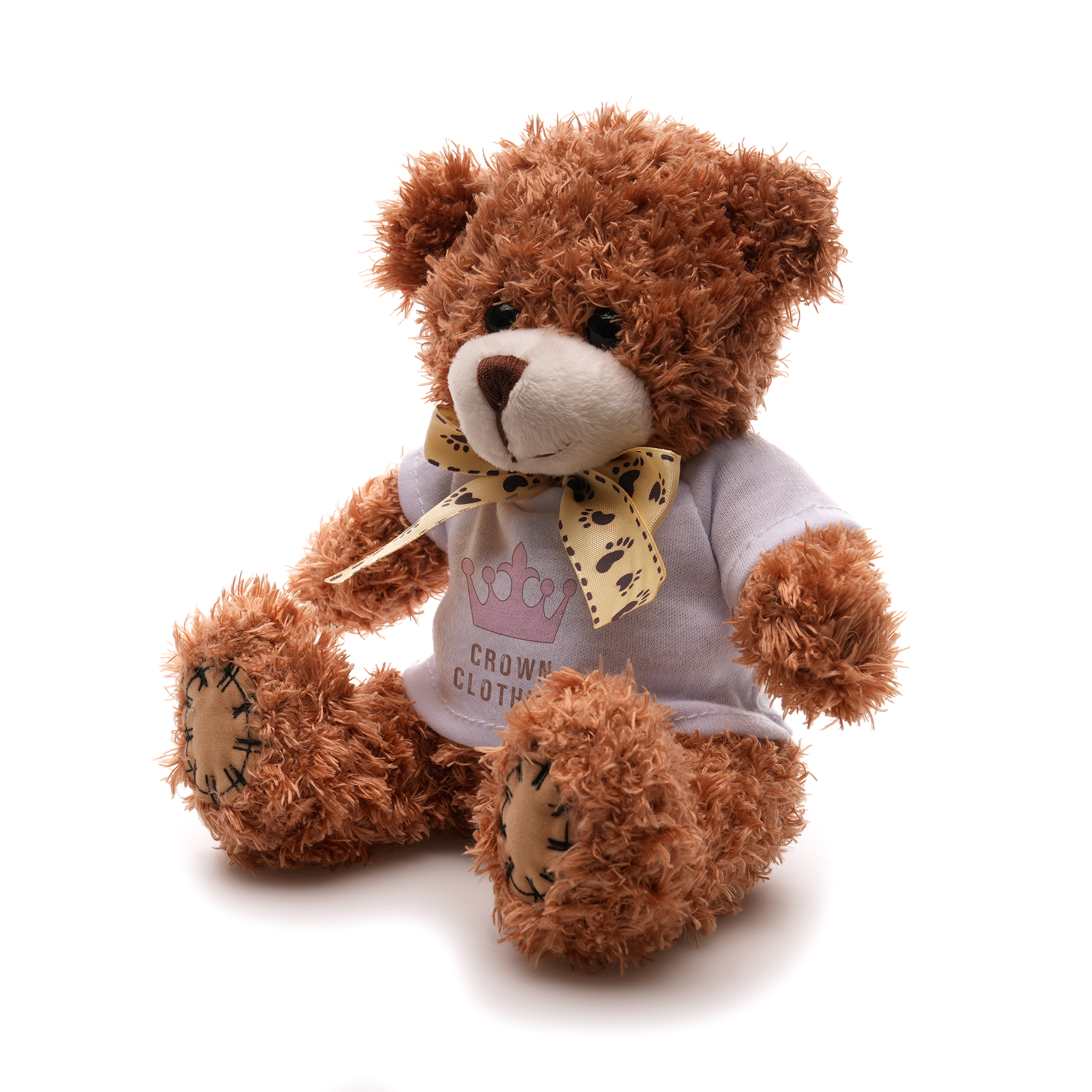 Crafted with polyester skin fabric and charming ribbon neck tie for added elegance, this 18cm teddy bear comes with cotton filler, embroidered thread nose and mouth and PP plastic eyes, adding a delightful tactile element with white t-shirt for branding.