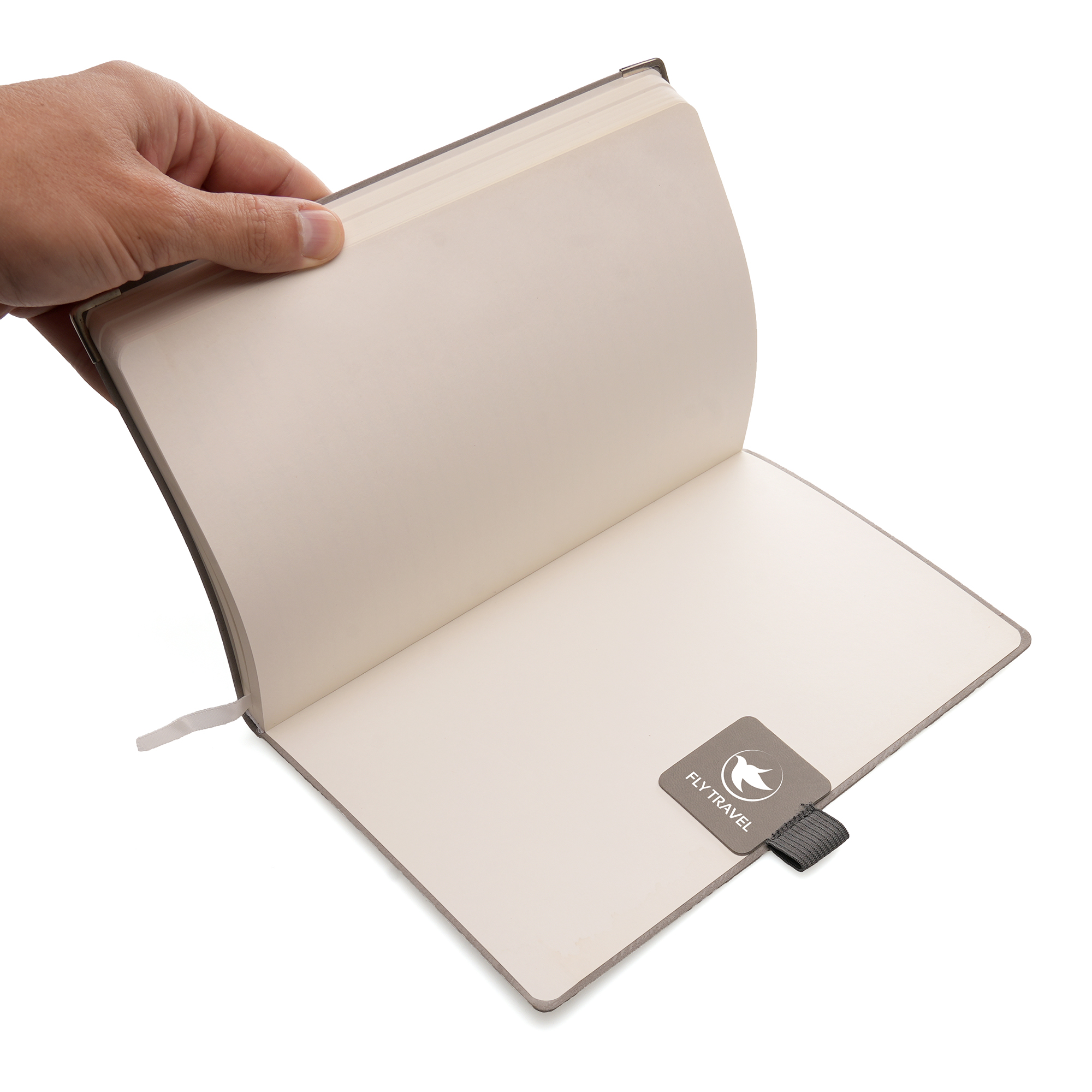 Elastic pen loop mounted to a PU leather patch with a self-adhesive backing to attach to the back of your notebook. Pantone matching available at an additional cost