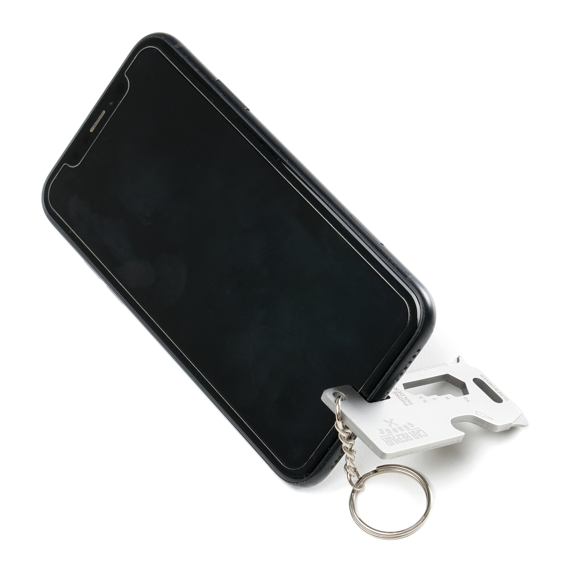 Stainless steel multi-tool keyring with built-in phone holder, screwdriver, ruler, and opener. Includes split ring attachment.