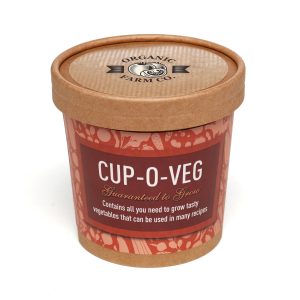 12oz natural paper cup containing two Cocopress® compost tablets, a seed packet with 5 varieties to choose from Cabbage, Lettuce, Onion, Parsnip and Radish along with planting instructions and a branded paper label to the lid.