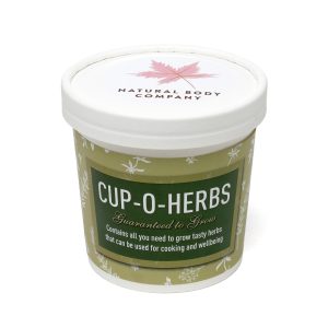 12oz white paper cup containing two Cocopress® compost tablets, a seed packet with a wide variety to choose from including basil, chamomile, chives, fennel, herb mixture (basil and chives), mint, parsley, sage along with planting instructions and a branded paper label to the lid.