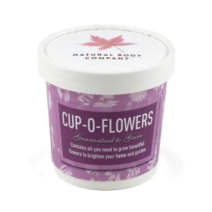 12oz white paper cup containing two Cocopress® compost tablets, a seed packet with a wide variety to choose from including English daisy, butterfly and bee mixture, cornflower, forget me not, sunflower, dwarf sunflower, summer flowers, evening primrose, lavender, strawberry, poppy, wildflower and Christmas tree along with planting instructions and a branded paper label to the lid.