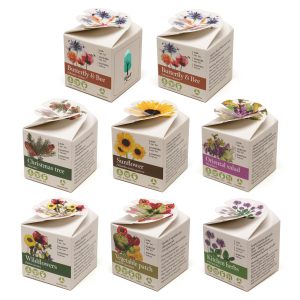 A pre-printed carton with a flower style closure containing a mini terracotta flower pot, Cocopress® compost tablet and a packet of seeds of your choice. The carton has one plain side, ready for a digitally printed label with your logo or message. Carton also includes growing instructions. Choose from a wide range of ready-made designs to reflect the seed of your choice.