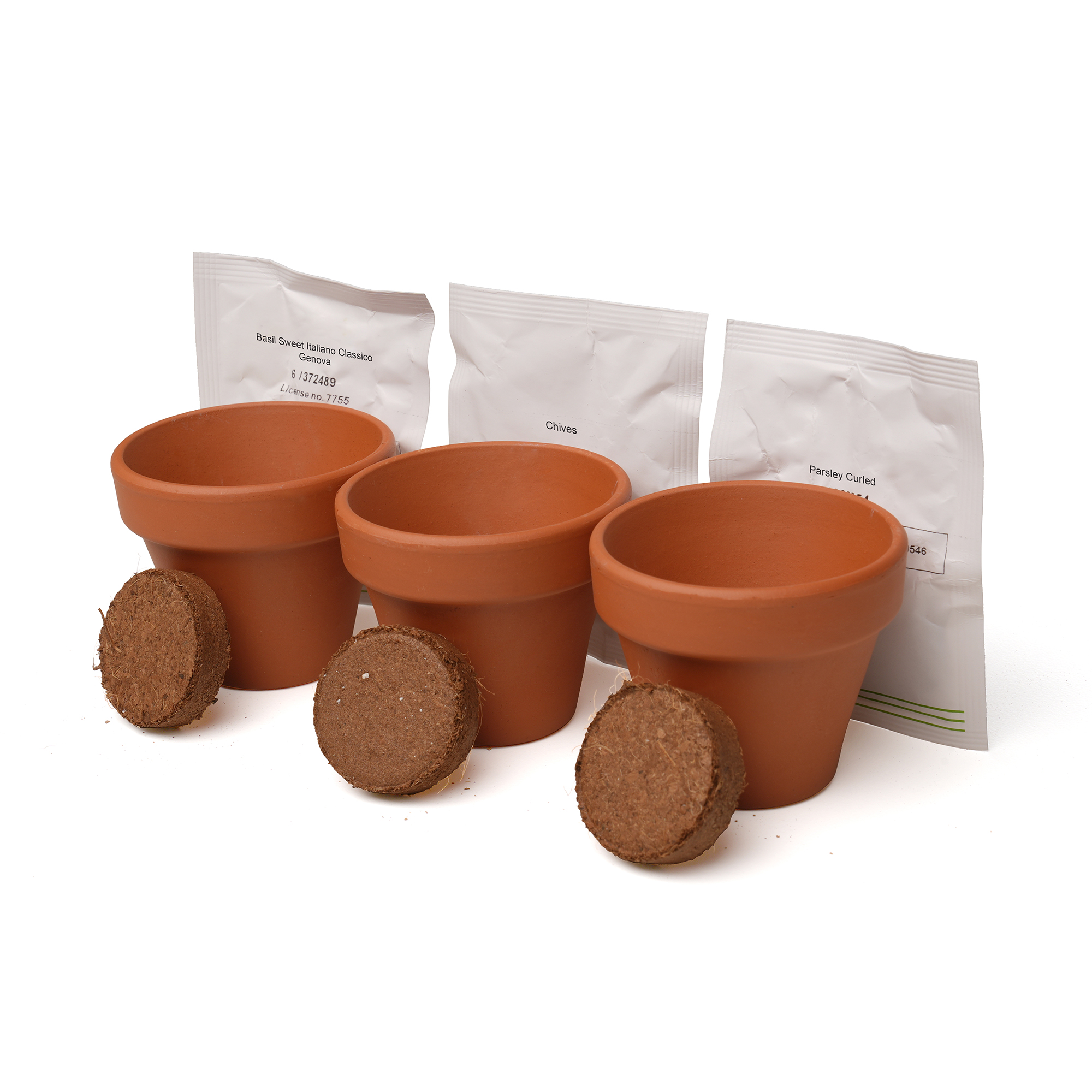 Three 55mm terracotta pots each containing a Cocopress® peat-free compost tablet and a different packets of seeds. The set is neatly presented in natural kraft packaging with a pre-printed sleeve featuring a dedicated space on the front panel for a full colour logo. Choose from the following trio options: Herb (Basil, Chives, Parsley), Sunflower (Giant Sunflower, Evening Sun, Sunspot Dwarf), Wellbeing (Chamomile, Evening Primrose, Lavender).
