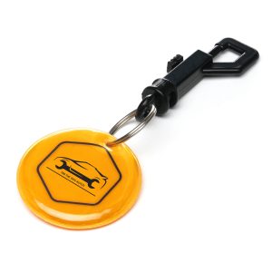Round reflective foam padded keyring with silver split ring and black plastic swivel trigger clip. Great for visibility and ideal for school bags, backpacks, keys and everyday use.