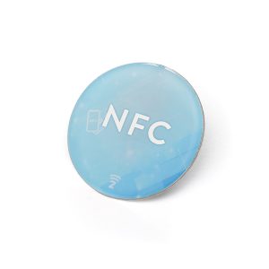 A sleek round iron pin with a butterfly clutch and domed finish, customised on one side and embedded with an NFC chip. Instantly share digital information, links, or contact detail, just tap with any compatible device.