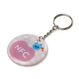 Bespoke rigid PVC keychain with split ring attached embedded NFC chip. Instantly share links, contact details, or digital content just tap with any compatible device.